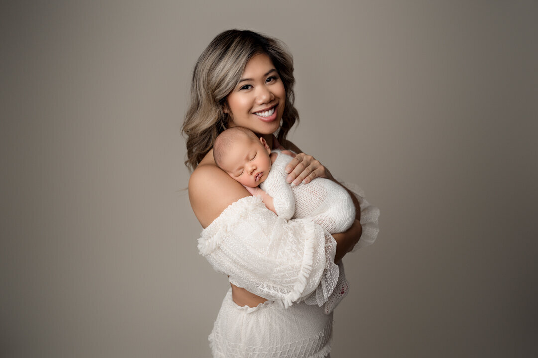 Grand Rapids Newborn Photography  Mom Holding Baby by For the Love of Photography