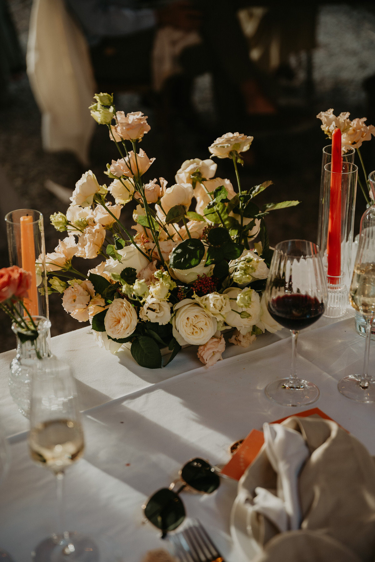 Wedding flowers on a table during the wedding breakfast at Chateau Canet in Carcassonne. 