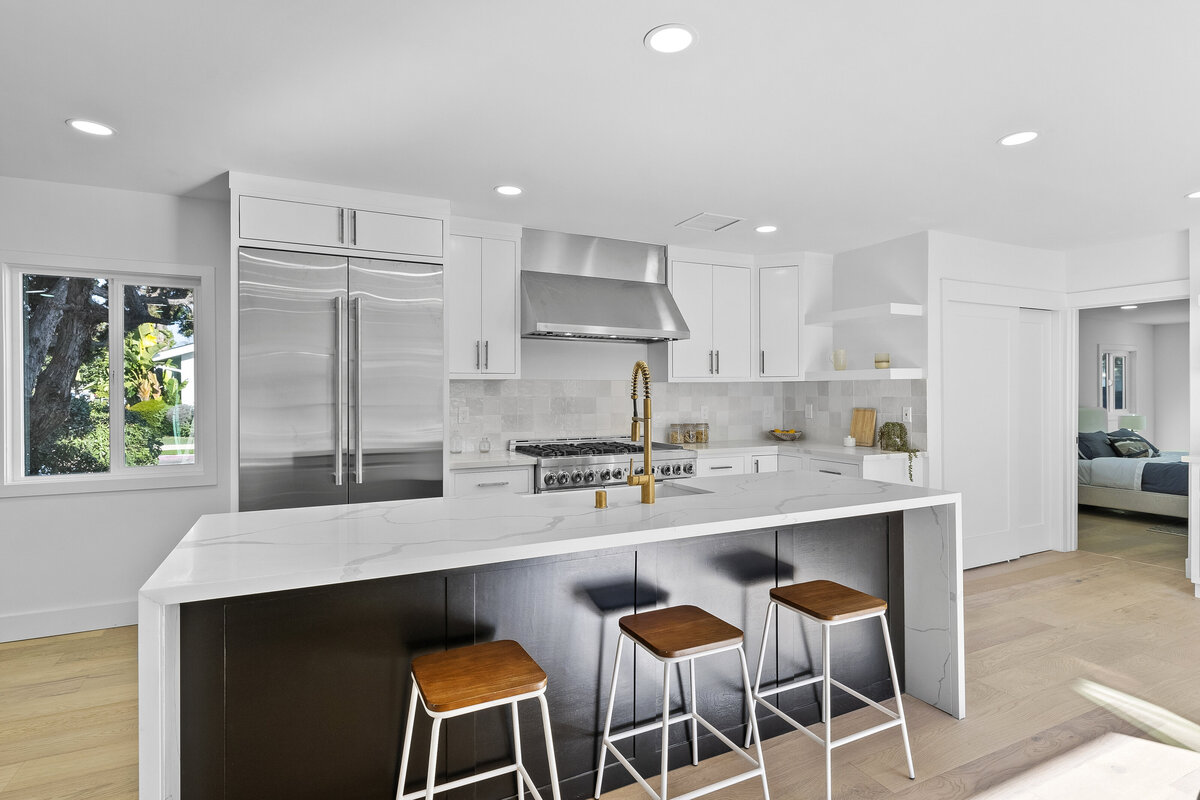 modern-white-black-kitchen-waterfall-island-barstools