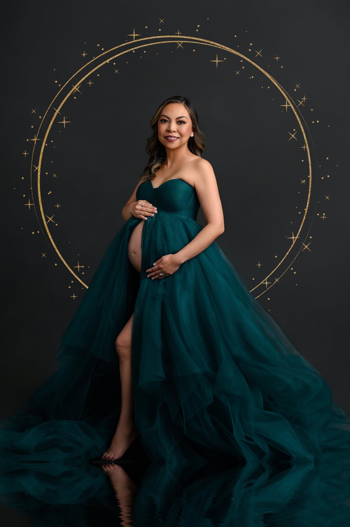 Studio maternity glam portraits in Loxahatchee featuring glamorous posing and styled wardrobe.