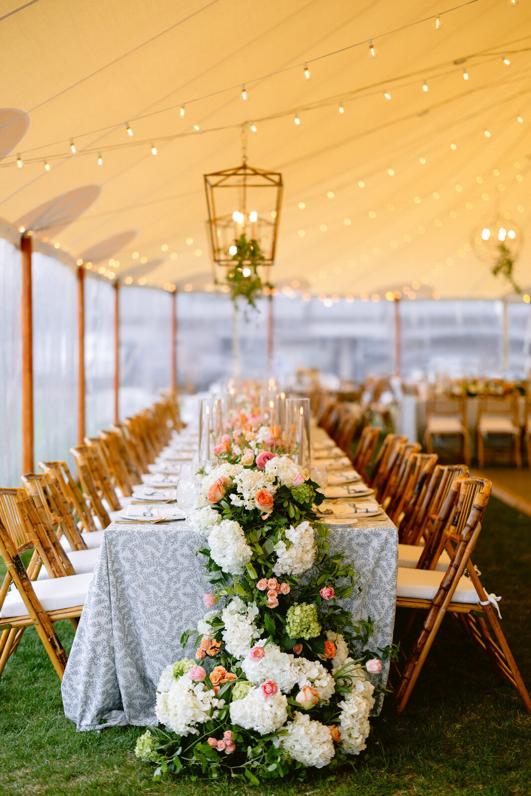 Kate-Murtaugh-Events-Weekapaug-Inn-tented-wedding-floral-garland-spring-flowers