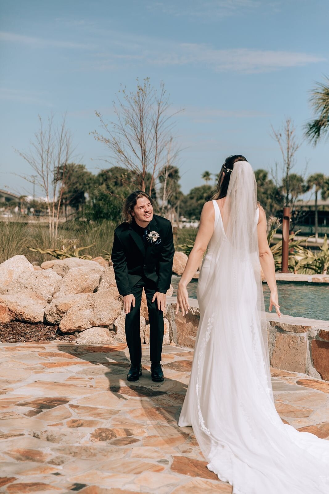 grooms reaction to seeing his bride for the first time during their first look