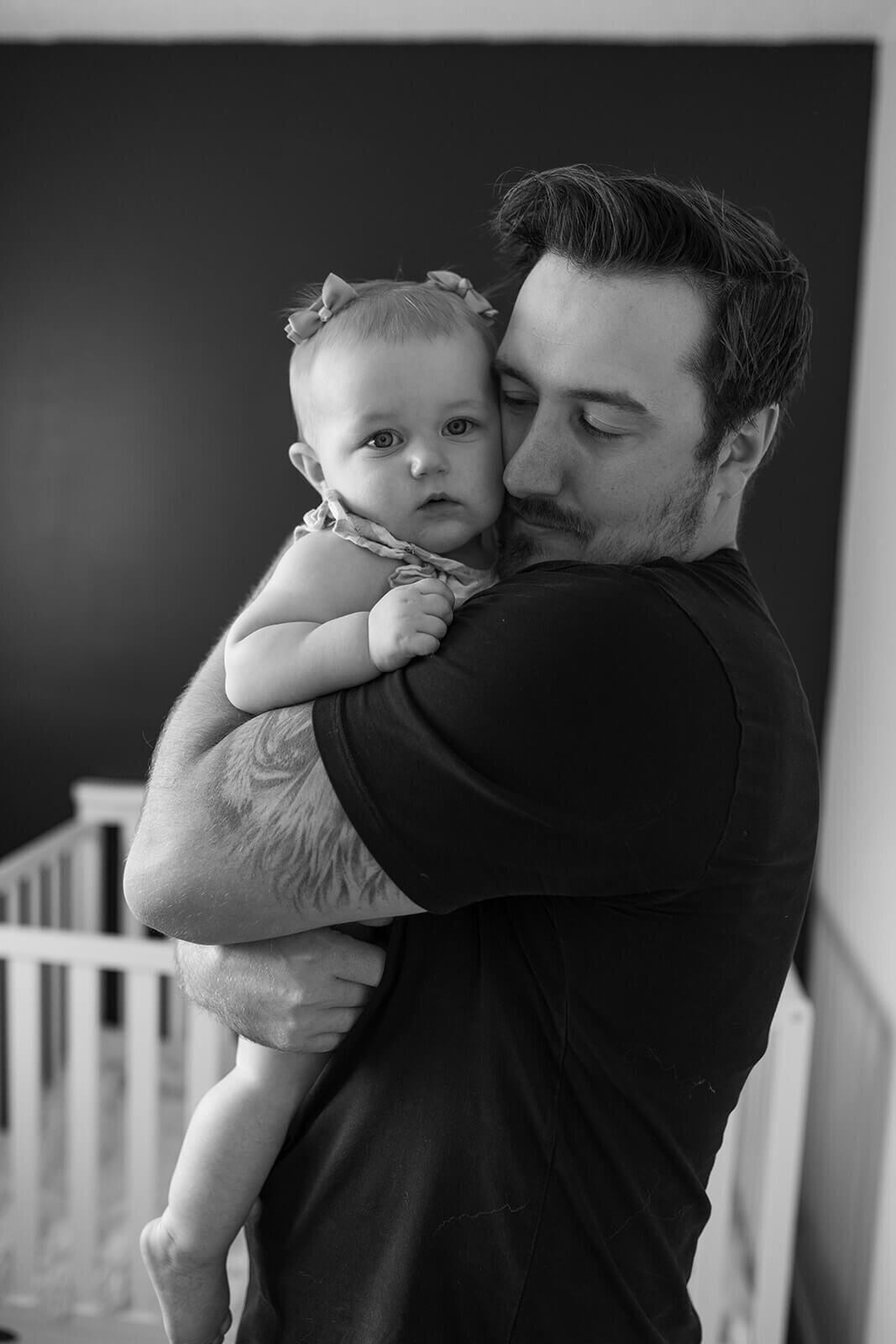 Father-hugging-his-baby-girl