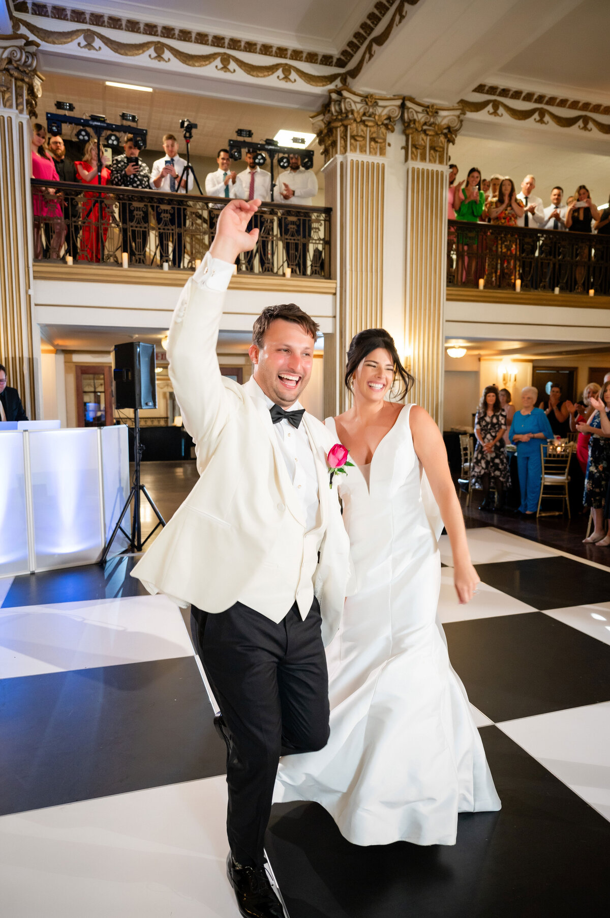 married couple coming into their wedding party at washington pa wedding venue