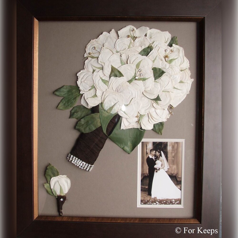 Pressed rose and greenery in glass frame
