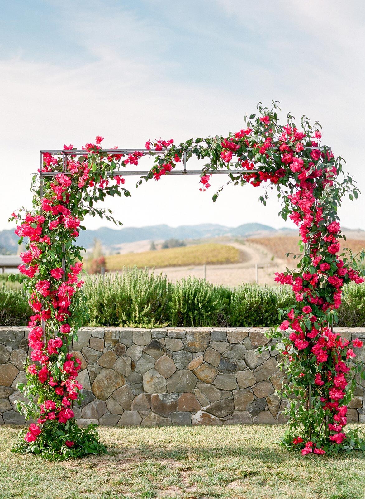 Carneros-Resort--Wedding-ceremony-red-flowers.