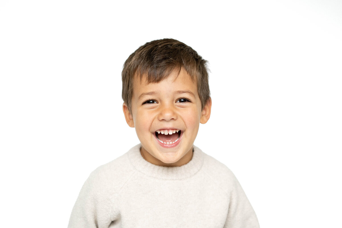 Fine Art School Portrait of 3 year old boy smiling in Boston, MA