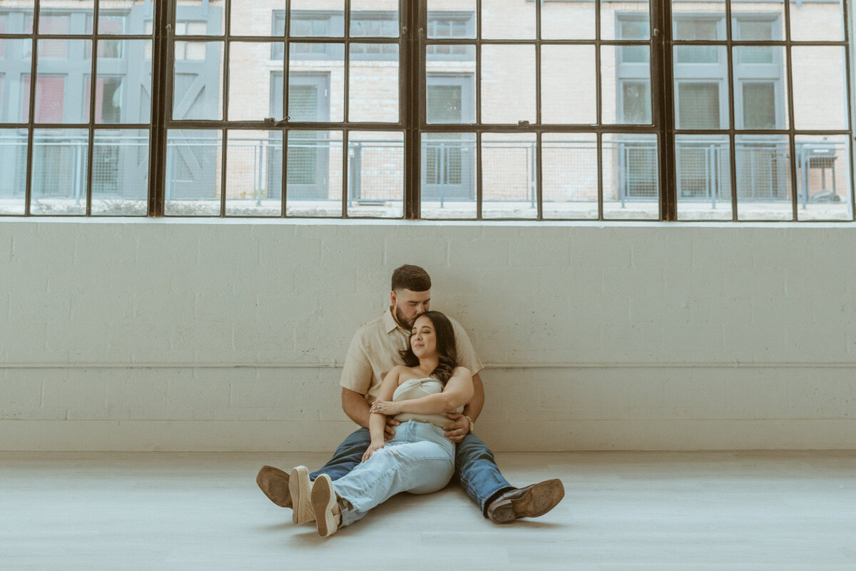 In the heart of Houston, I had the privilege of photographing an engagement session in a studio that embodied the essence of a downtown loft. With its high ceilings and industrial-chic aesthetic, the space provided the perfect backdrop for capturing the couple's urban romance in a contemporary and stylish setting.