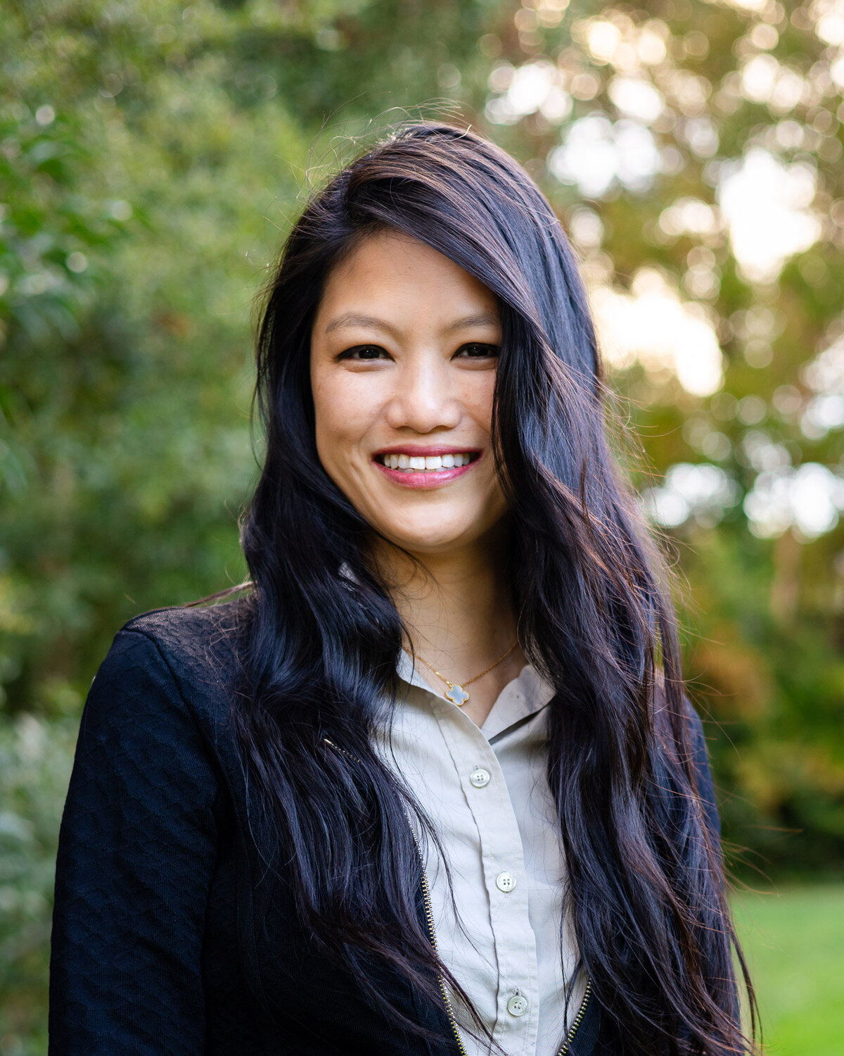 Confident professional headshot with long black hair outdoors – Bay Area Headshot Portfolio – Ellobelle Photography