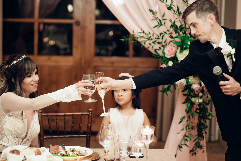 Wedding Photograph Of Bride And Groom Sharing a Toast Los Angeles