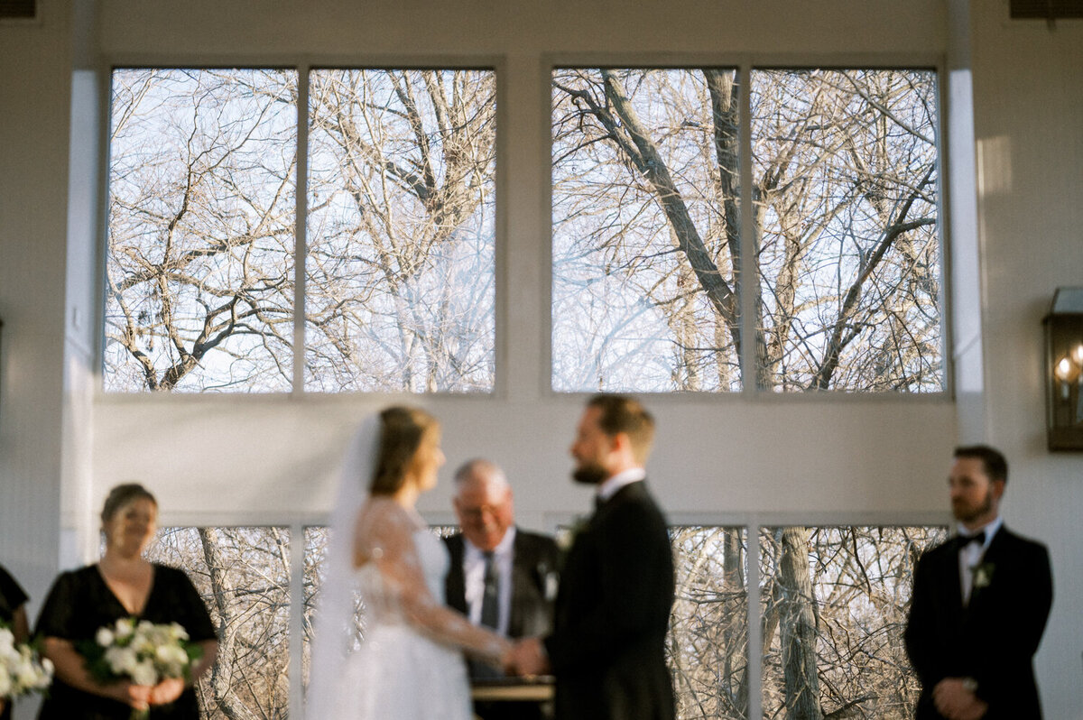 winter-wedding-ceremony-glass-chapel
