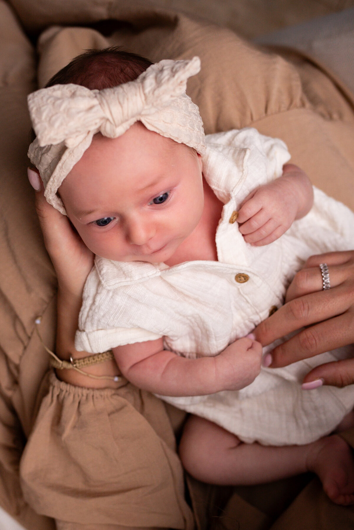 newborn-baby-nestled-in-home-darien-connecticut