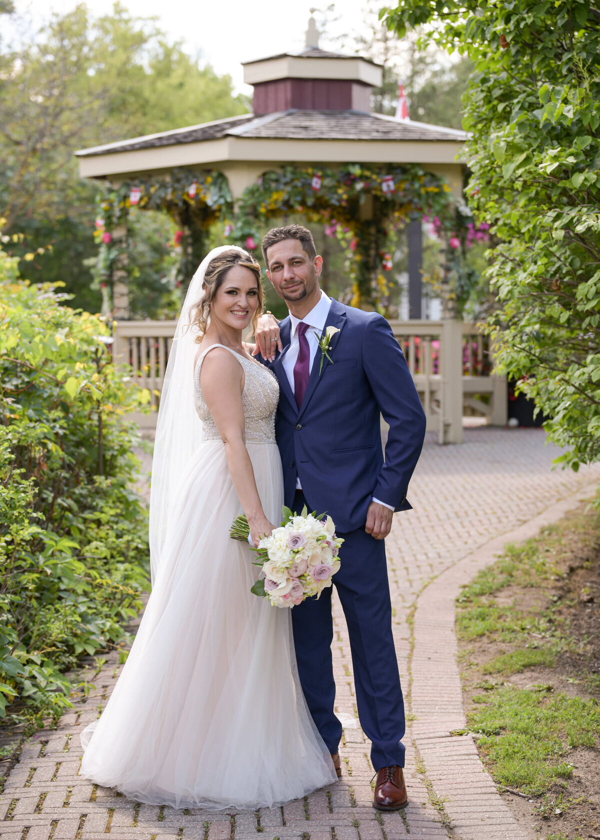 Couple sharing a sweet moment at a gazebo