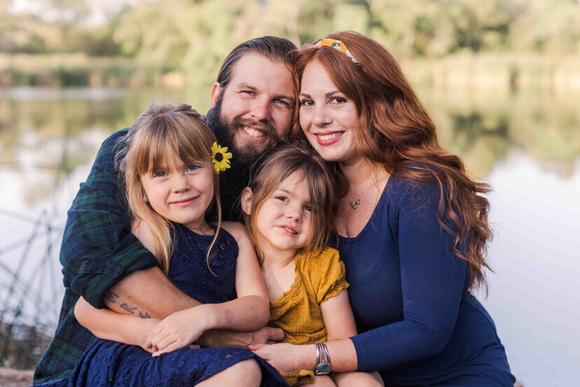 family-sitting-by-morrison-pond-bonita-san-diego
