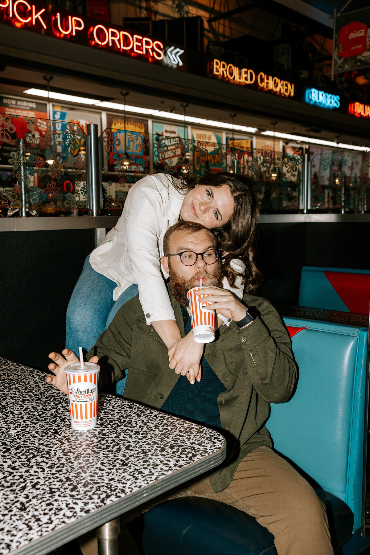 creative fun chicago flash engagement photos at Portillos Hotdogs-38-ed-lucy