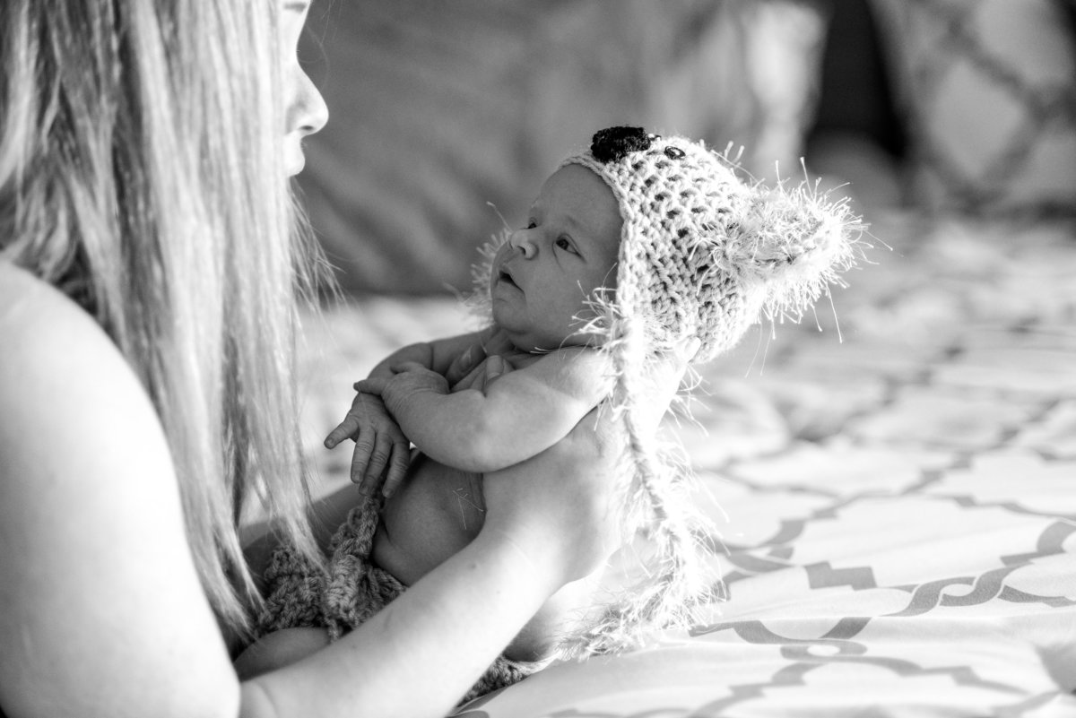 black and white photo of a newborn