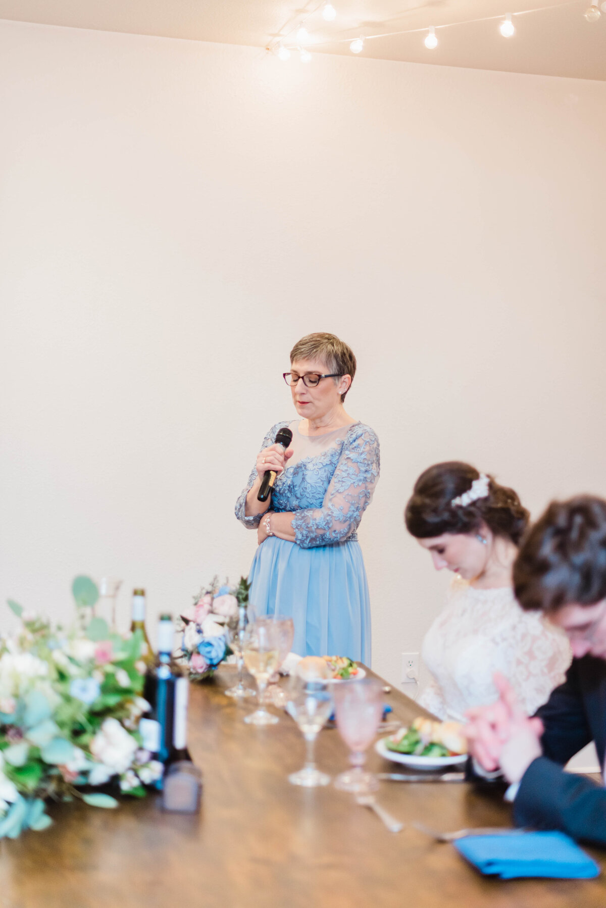 Denver wedding photographer captures a photo of the mother of bride giving a toast