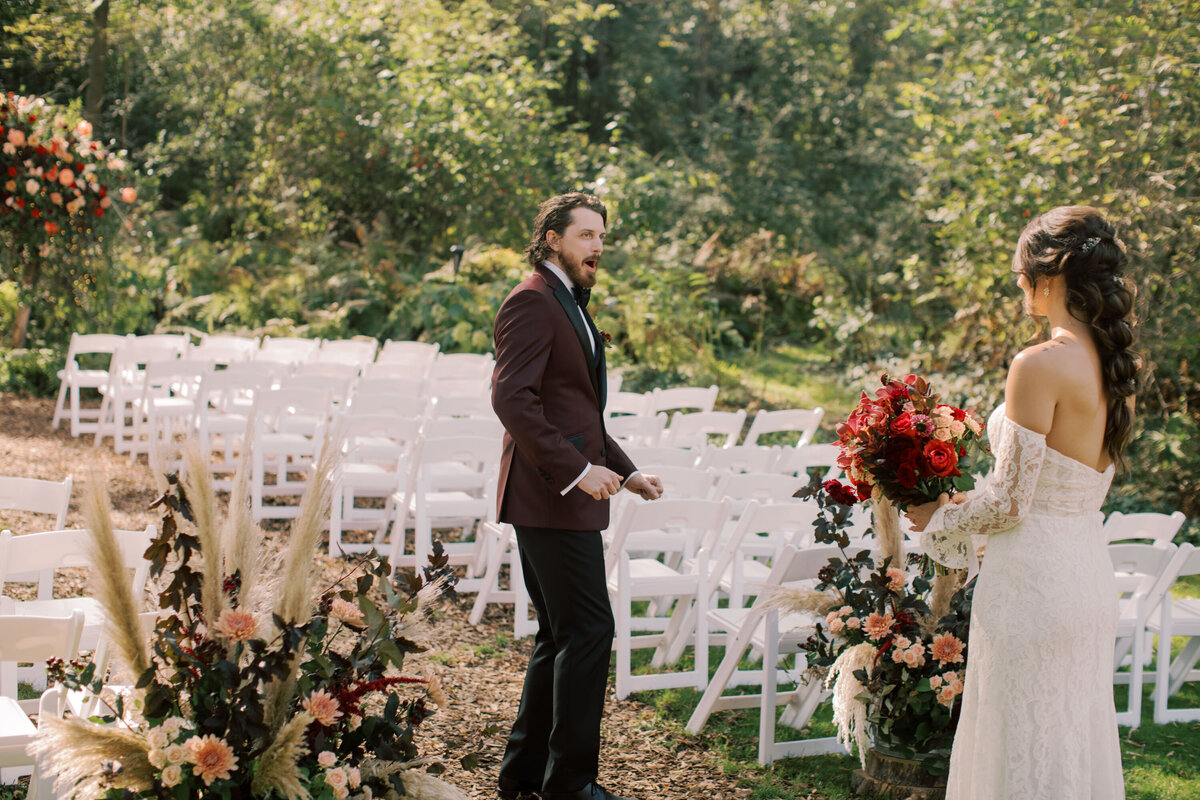 grooms reaction to the first look of his bride to be 