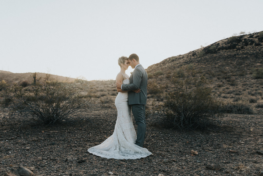 Bride and Groom embrace during their desert elopement in Phoenix, Arizona.