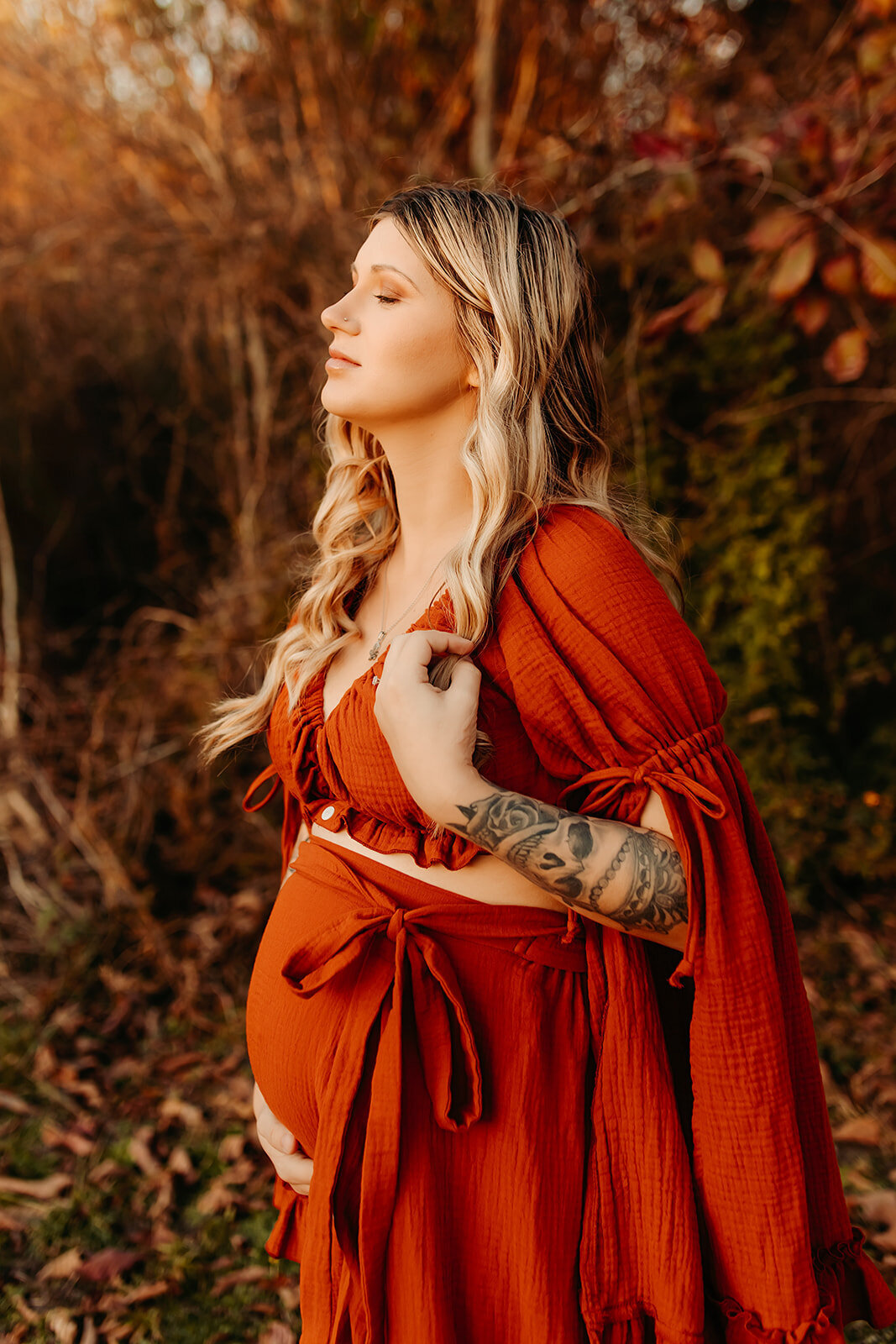 Houston TX maternity session—soft close-up outdoor portrait in burnt orange gown.