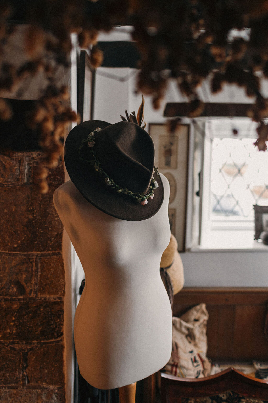 Detail shot of mannequin and hat at Rachel Snowdon's home studio in Okehampton