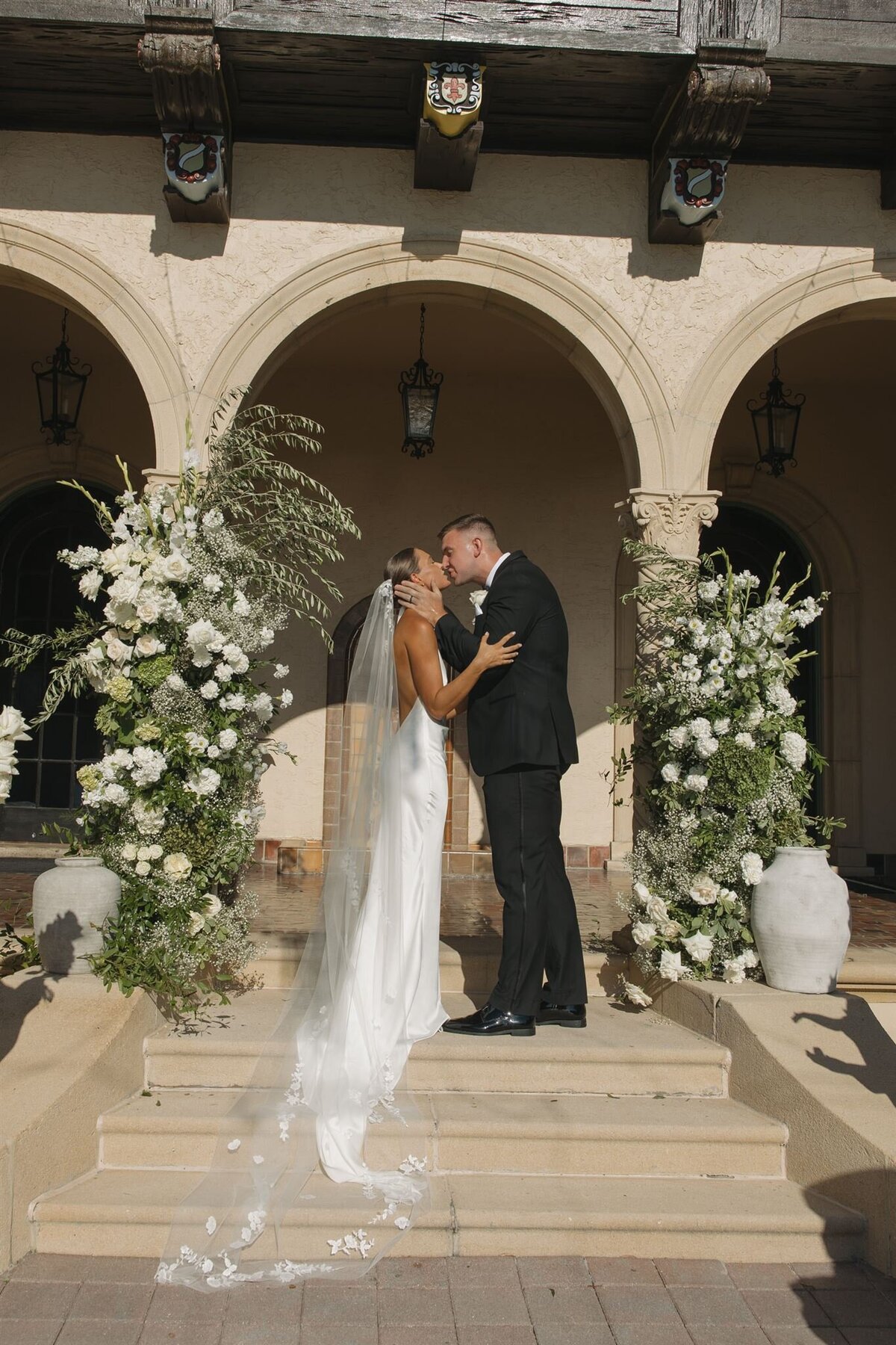Ceremony kiss at Powel Crosley Estate in Sarasota