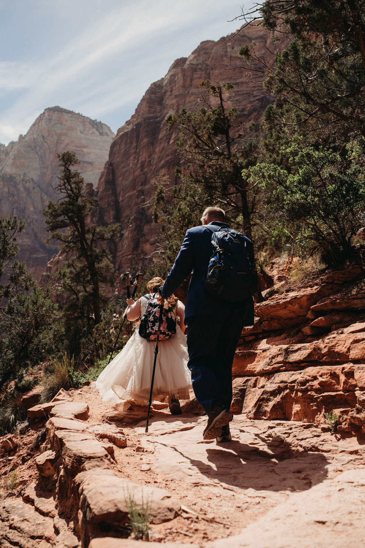 Couple hikes through Zion National Park in Spring by Paige Mireles an Ohio Photographer