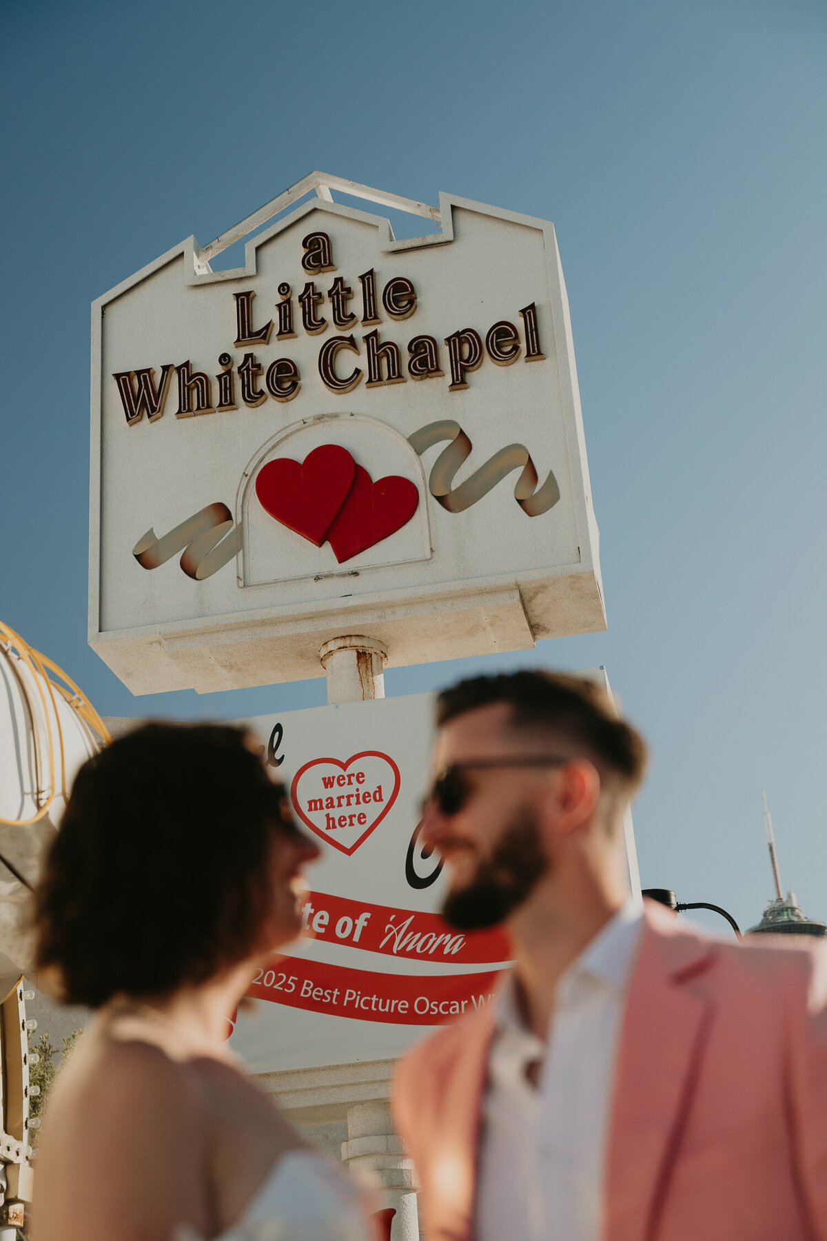 A bride and group outside A Little White Chapel in Las Vegas.