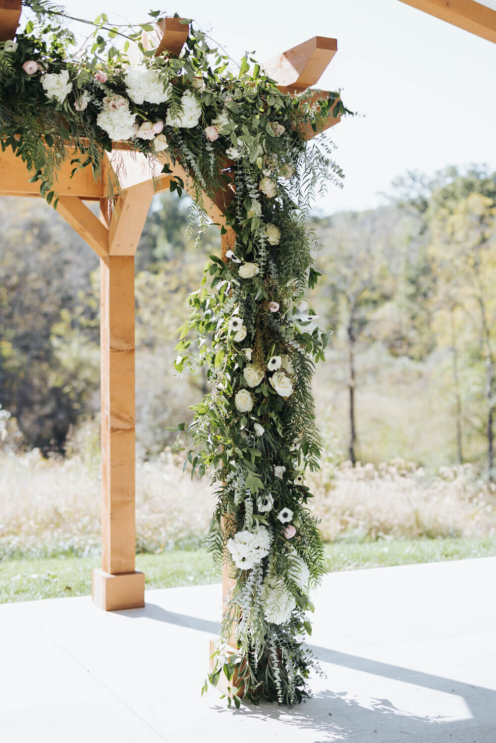 Shannan and Alex Wedding - pergola floral design