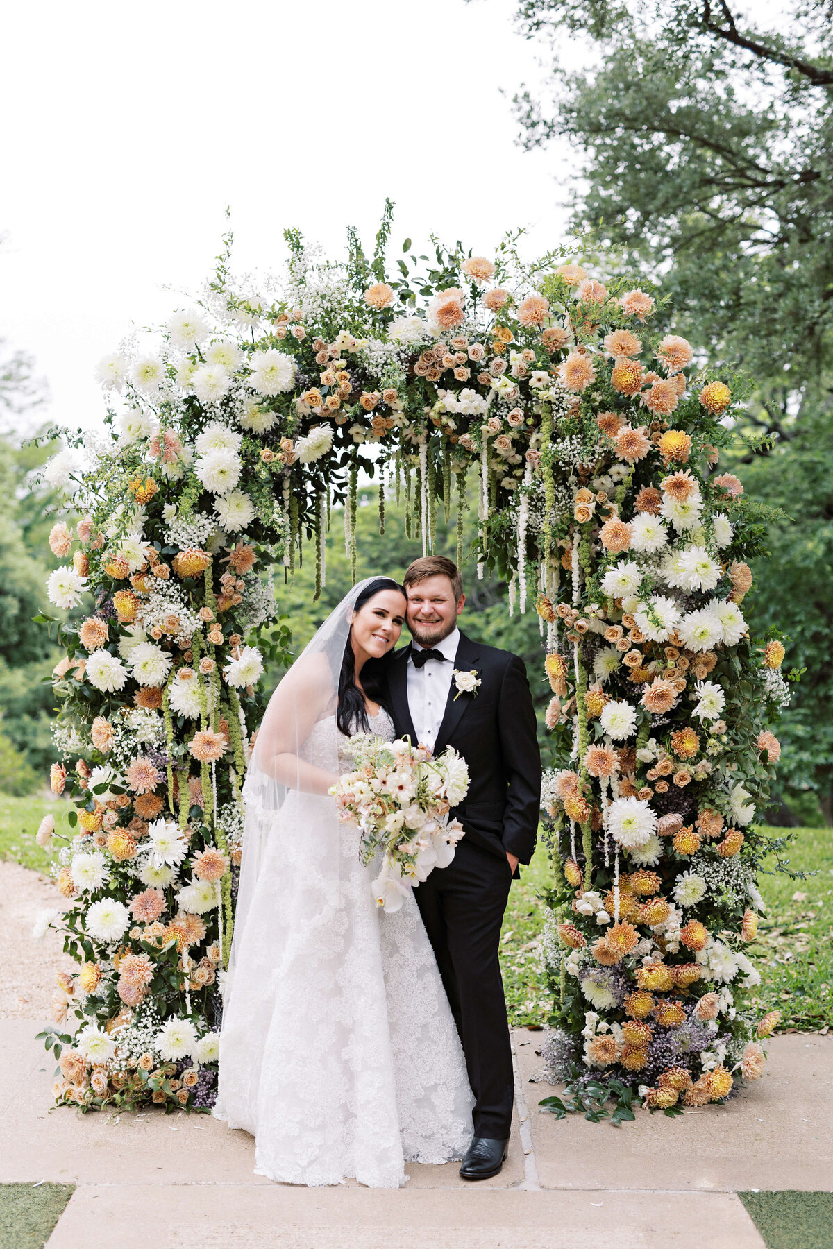 colorful spring floral arch by Stems Floral Design