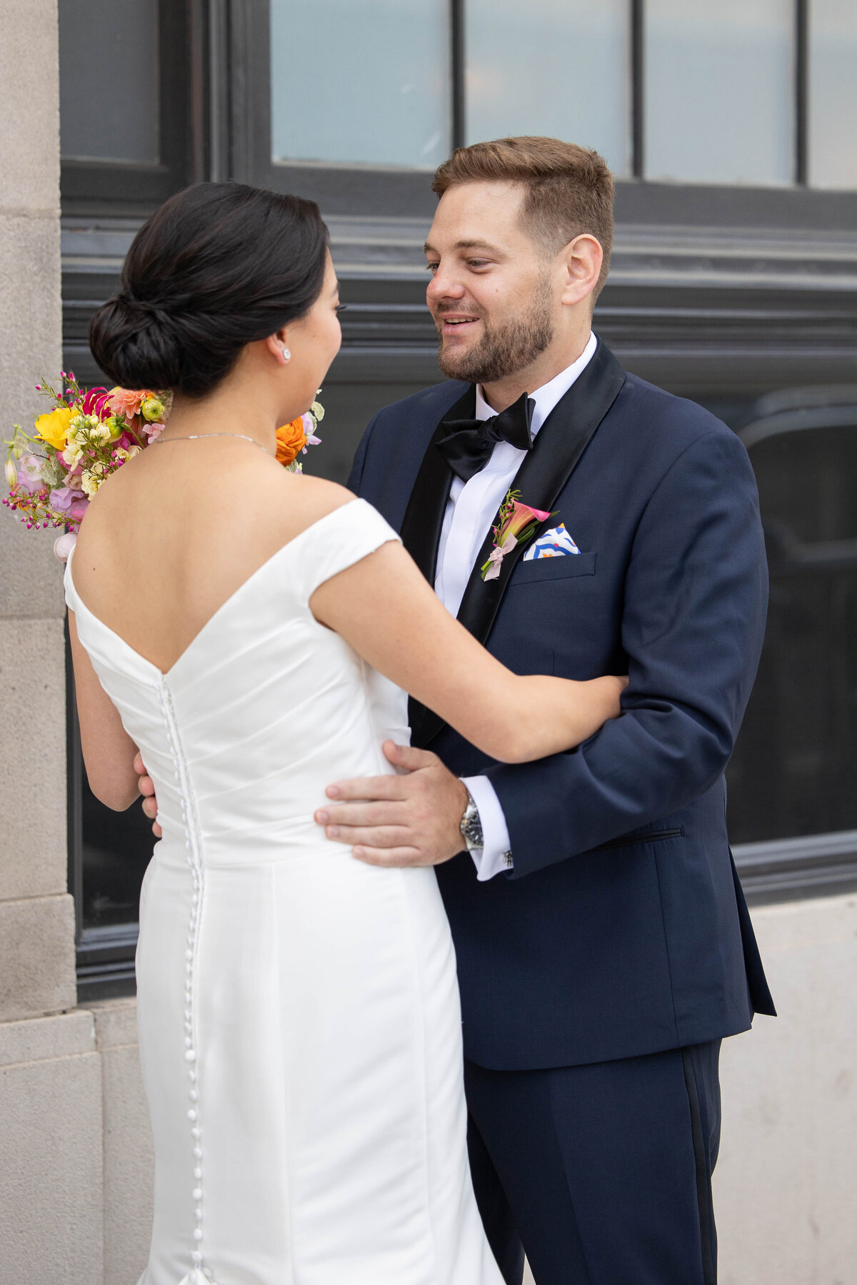 Bride and groom hugging