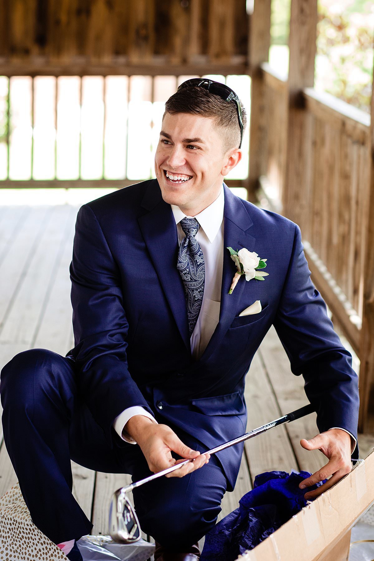 Groom surprised by new golf clubs on wedding day