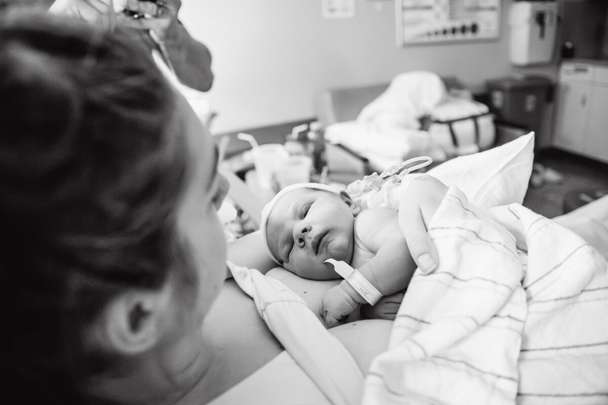 A woman in labor, pushing out the baby at Memorial Hospital in Modesto,  is having a much smoother birth because she hired a Modesto Doula for support. 