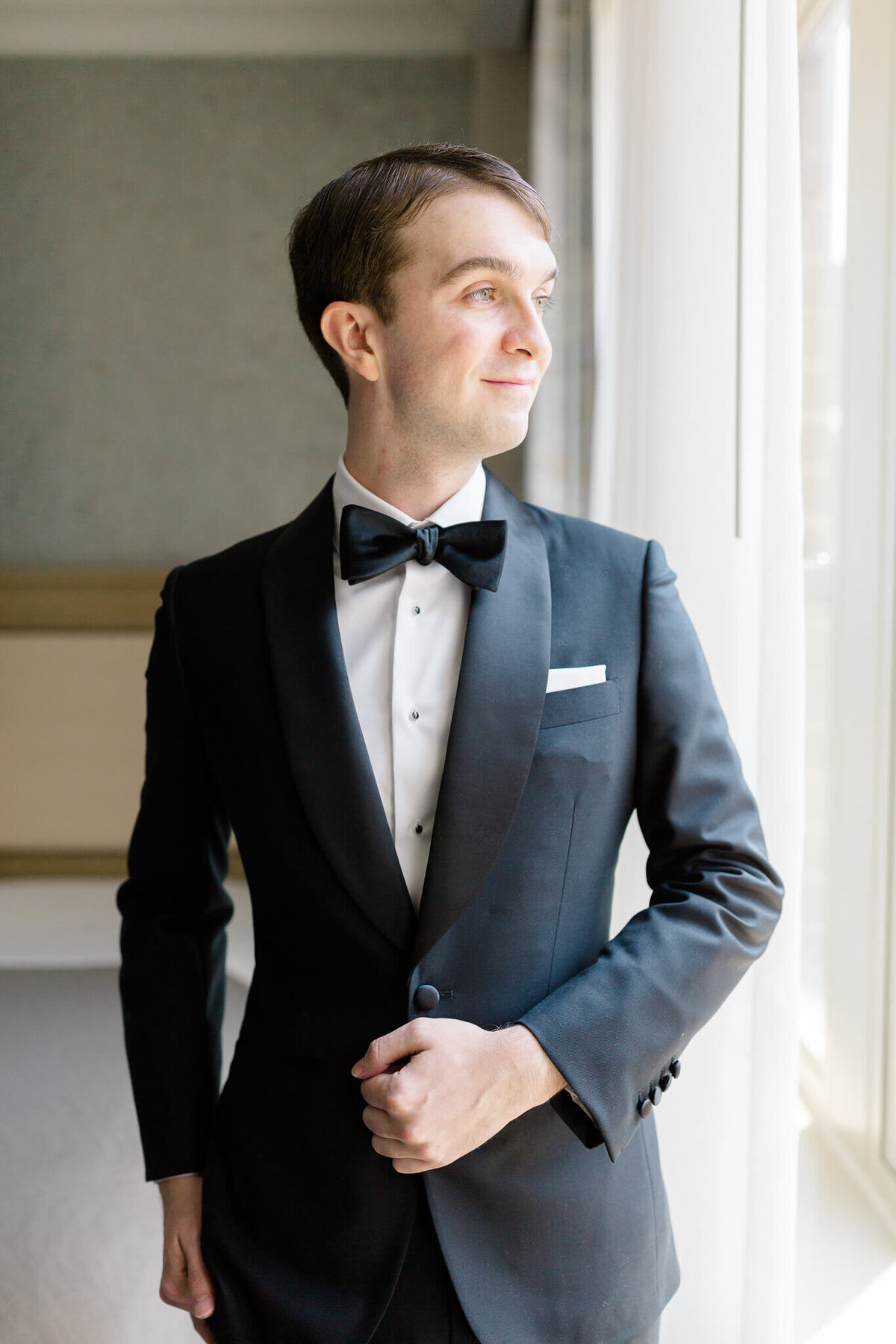 Groom during getting ready portraits in Washington, DC.