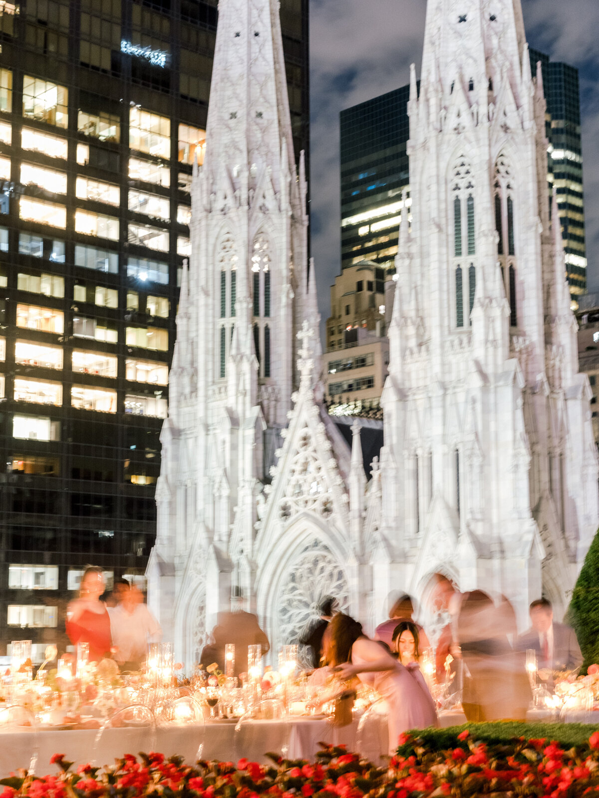 Long exposure wedding dinner by candlelight in front of St. Patrick's Cathedral in new york