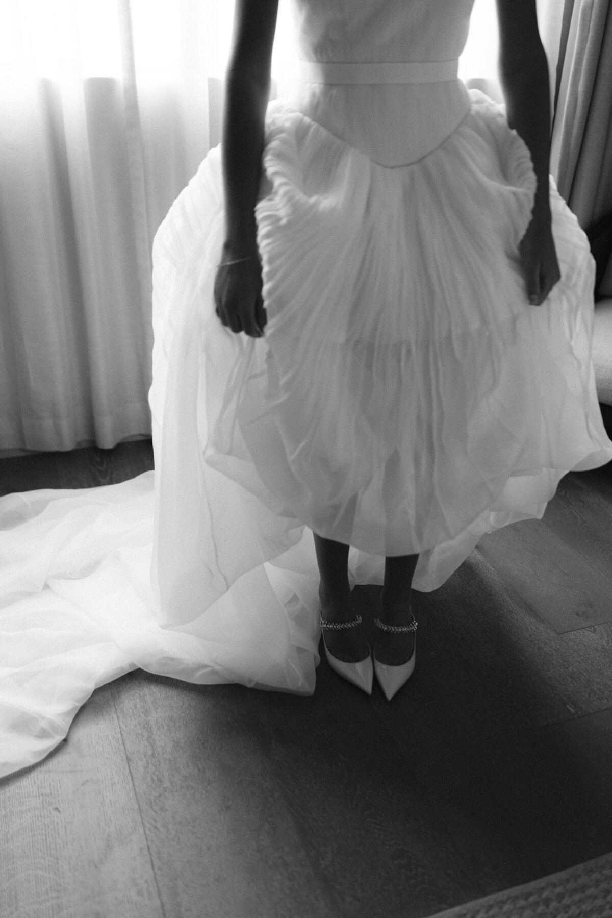 Sophisticated editorial wedding photography at NOBU Hotel Chicago featuring Lauren Alatriste's fashion forward approach, creating luxury wedding imagery that balances magazine-worthy editorial aesthetics with authentic bridal preparation emotion.