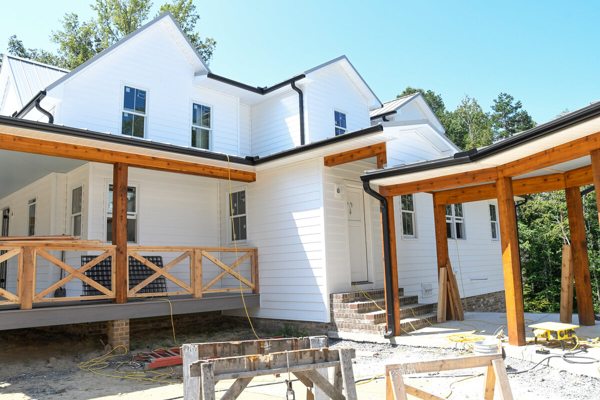 custom built farmhouse white siding interior