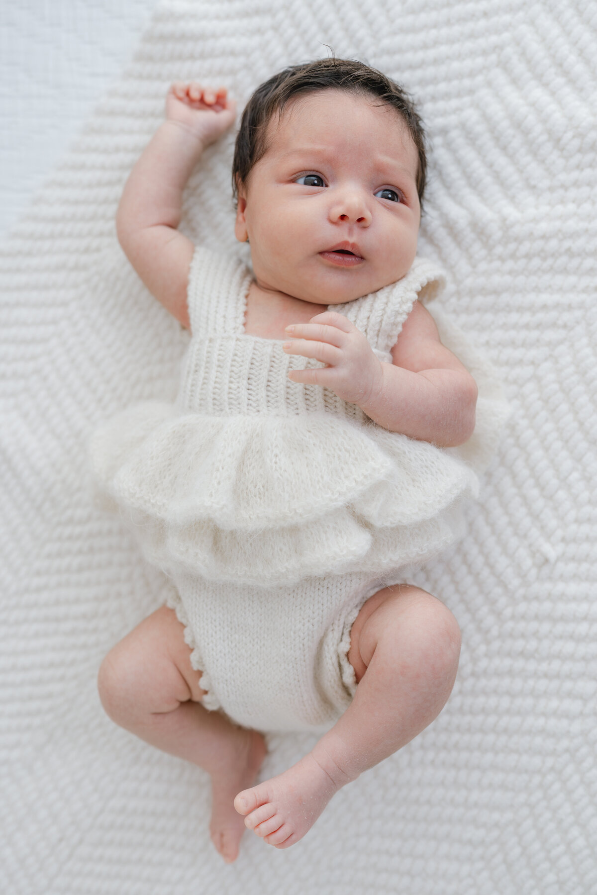 Close up of baby during natural light Barrie newborn photography session 