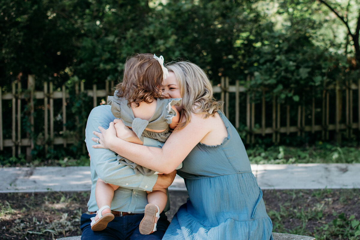 Family hug during a family photo session in Batavia, IL