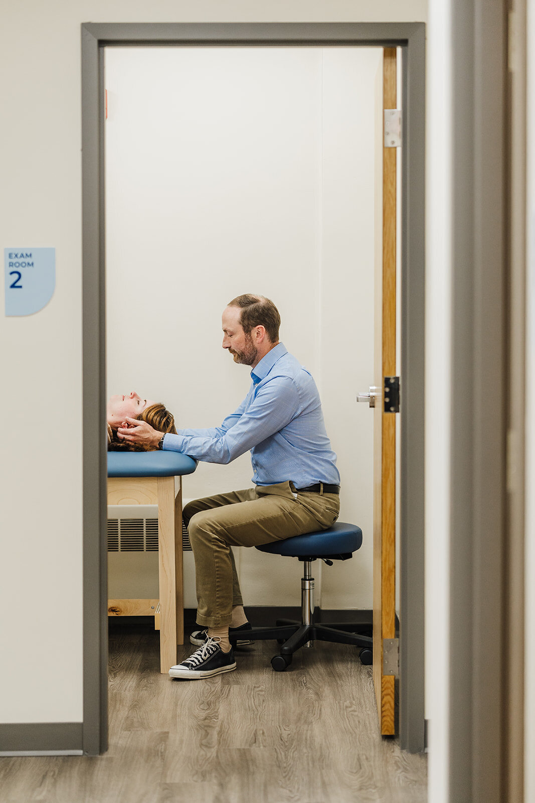 doctor administers treatment to patient in boston doctors office