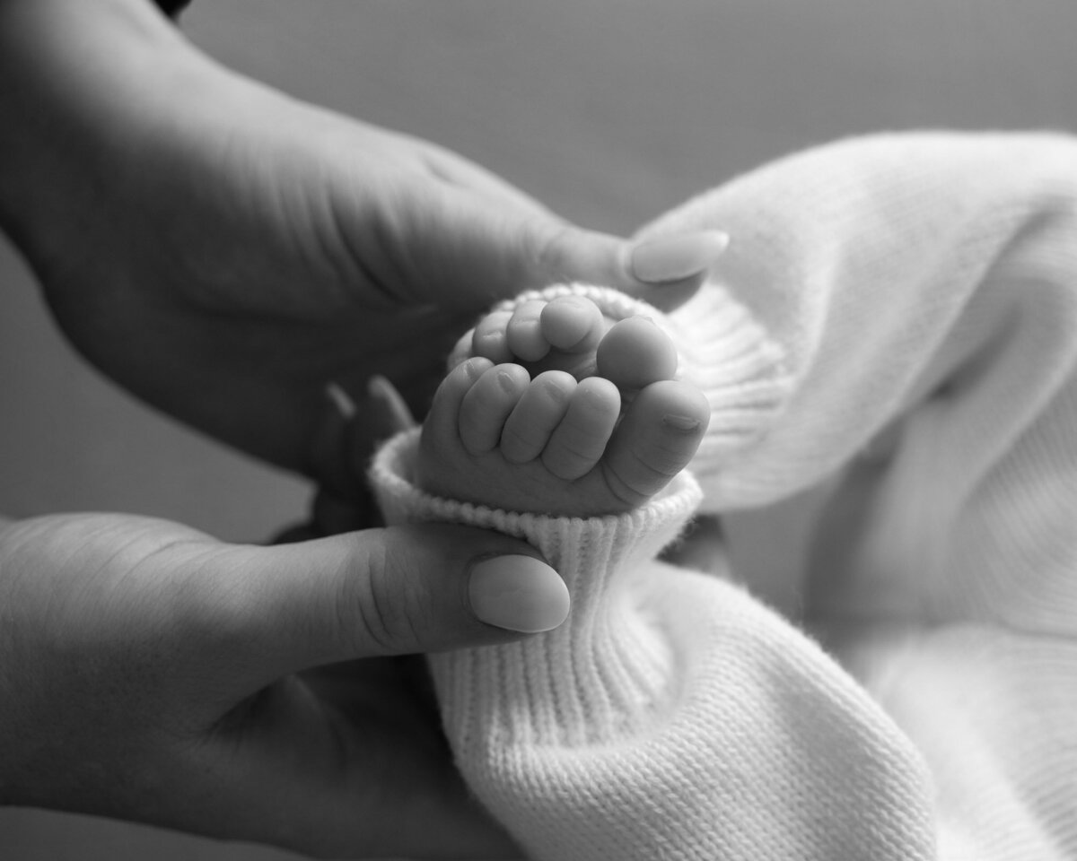 Black white newborn baby feet detail Georgetown artistic photographer