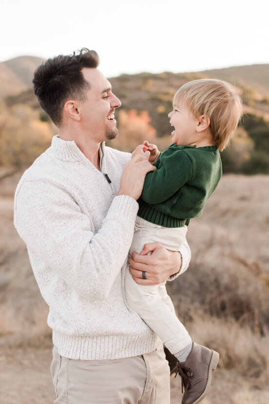 father-hugging-son-mission-trails-san-diego-portrait
