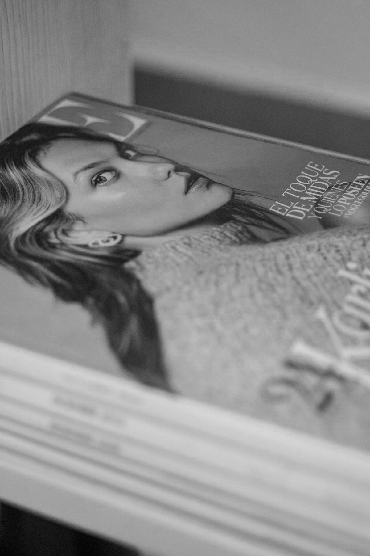 Black and white model on cover of magazine
