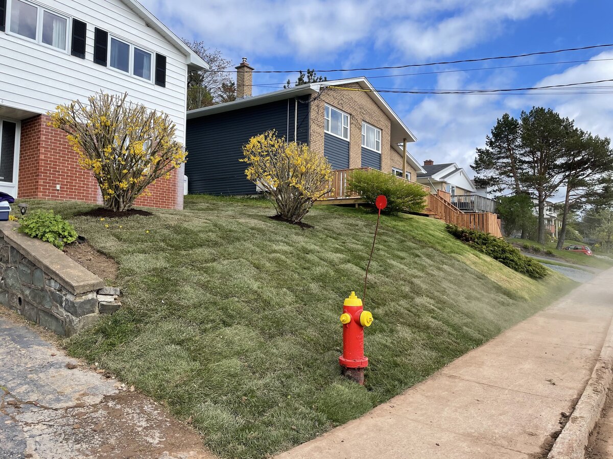 Ground Down Land Management - Halifax Excavation Services - Stone Landscaping Patio Work - sod installation - garden beds & mulch