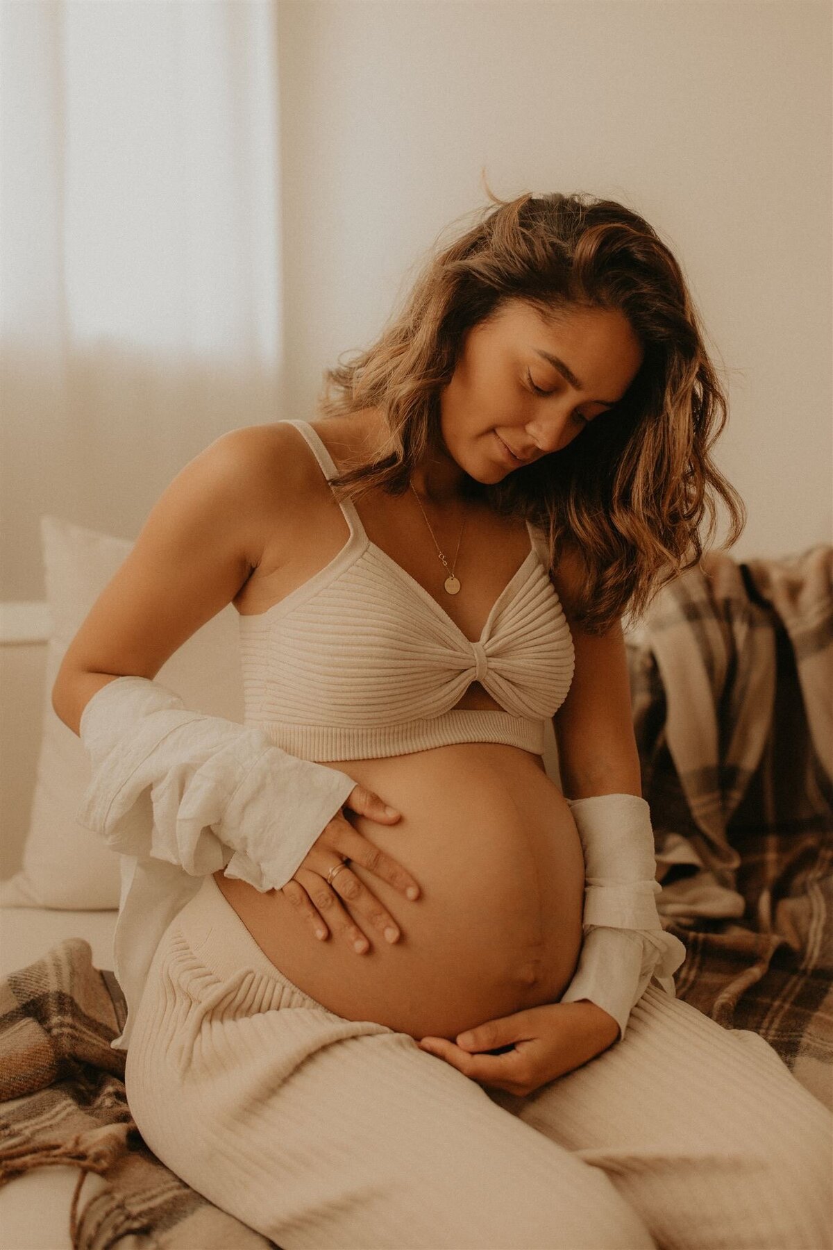 cozy family studio maternity photoshoot