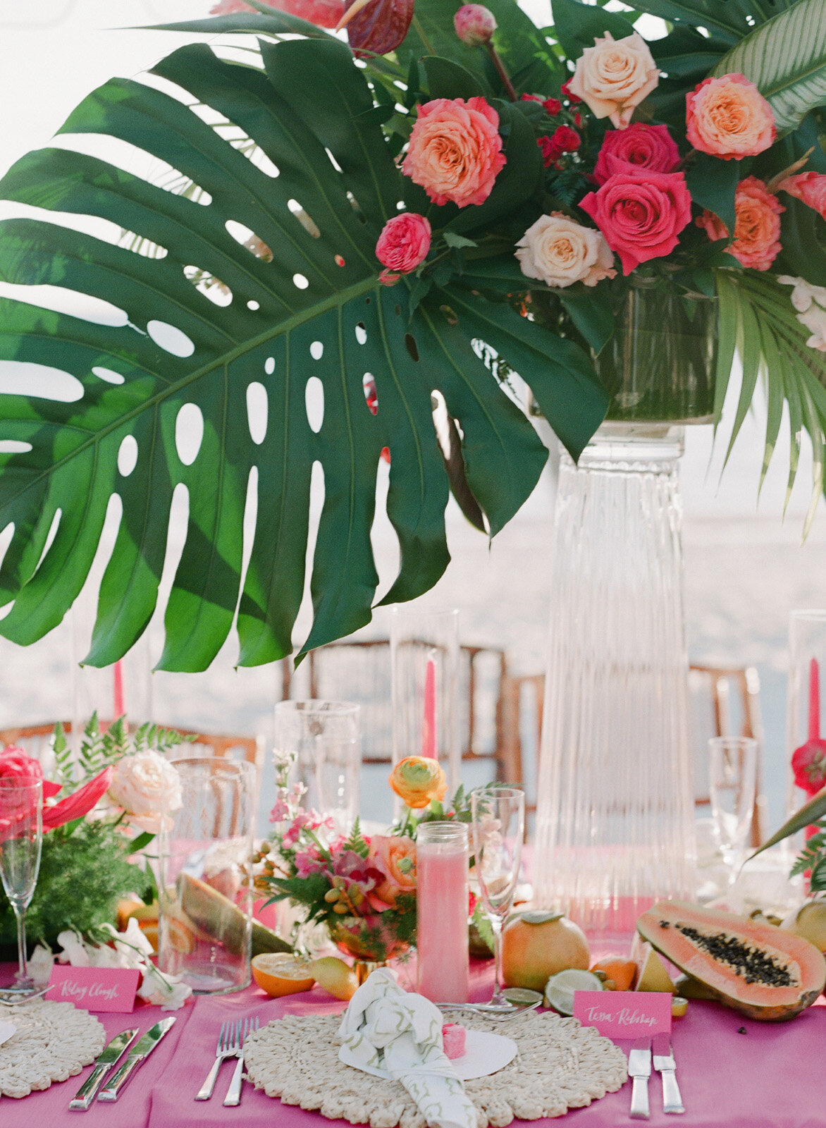 Kate-Murtaugh-Events-tropical-destination-wedding-planner-palm-flower-dinner-reception-centerpieces