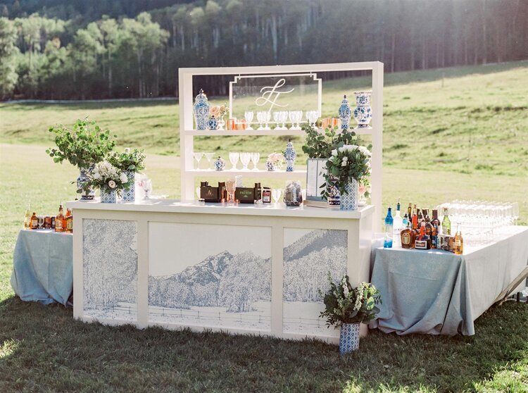 Outdoor bar set up at a custom outdoor wedding in the mountains