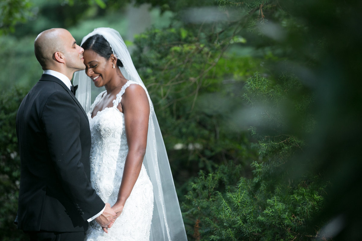 Bride and groom at the grounds of Westbury Manor