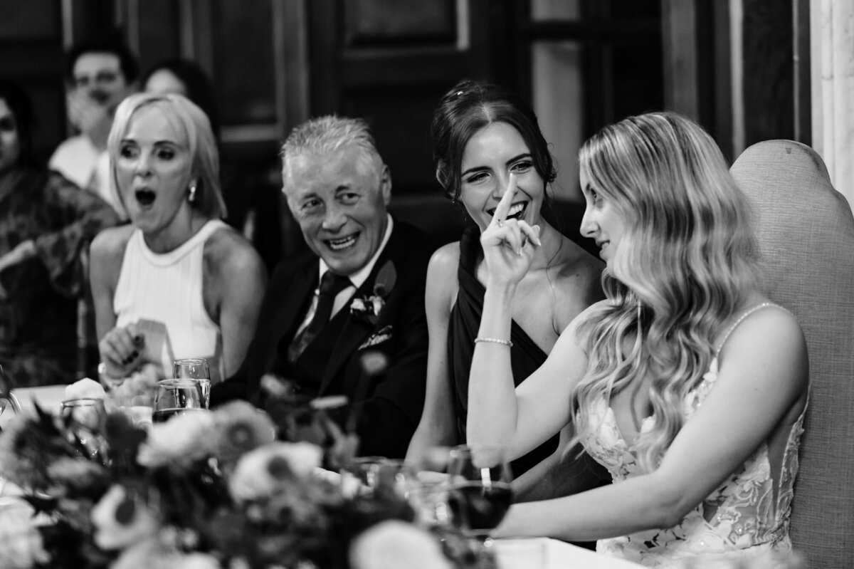 Bride reacting to grooms speech at gosfield hall