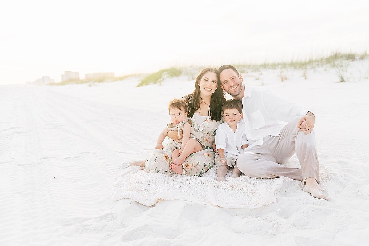 a happy family at Henderson Beach State Park